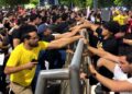 Apoiadores de Lula e Flávio Bolsonaro entram em confronto na UFRN. Veja vídeos